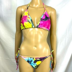 Tropical String Bikini. Top & Bottoms. NWOT. Large. Has Hygiene Liner and Pads.